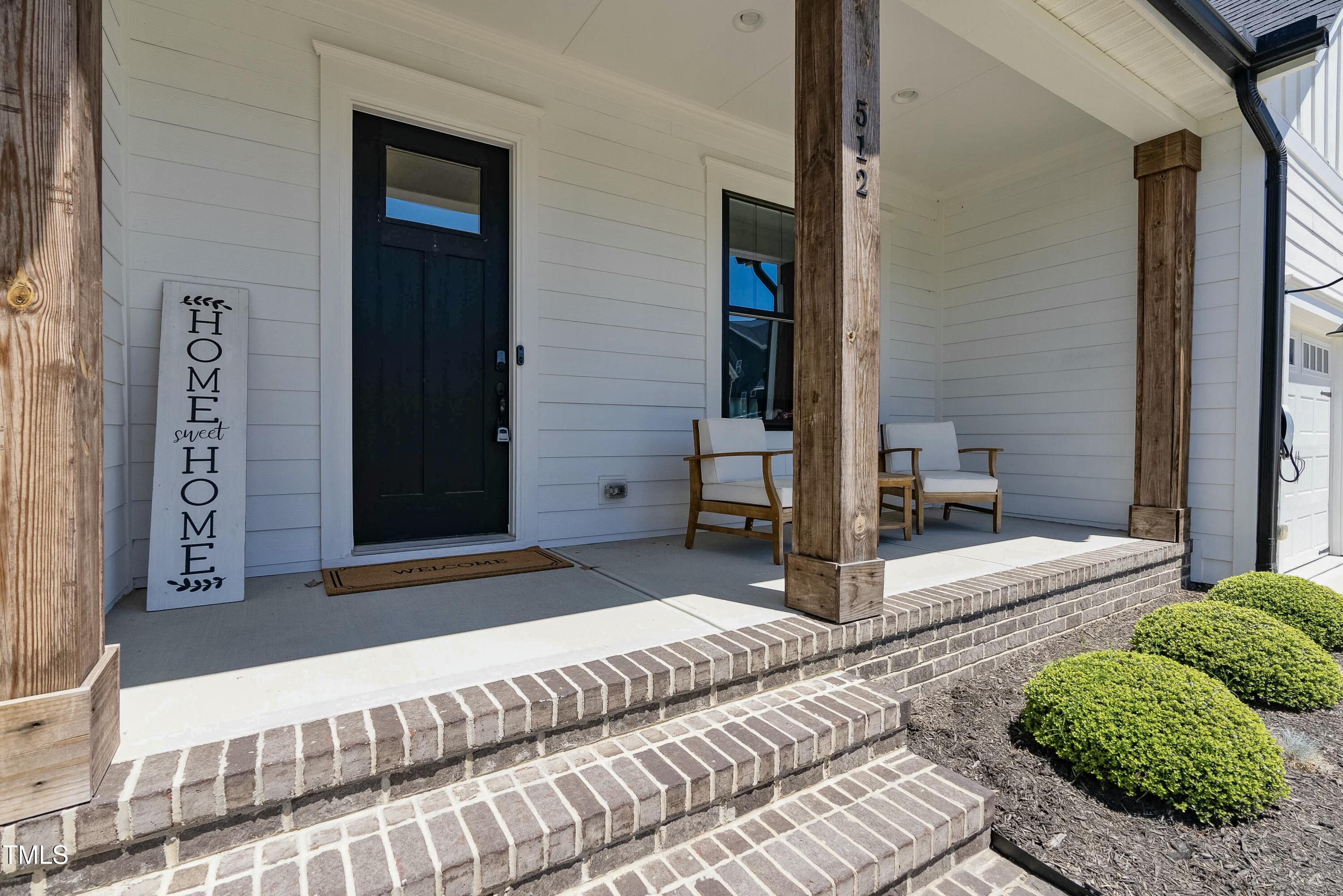 512 Adkins Ridge Road Rolesville, NC 27571 - Photo 6 of 53 a view of a entryway door of the house