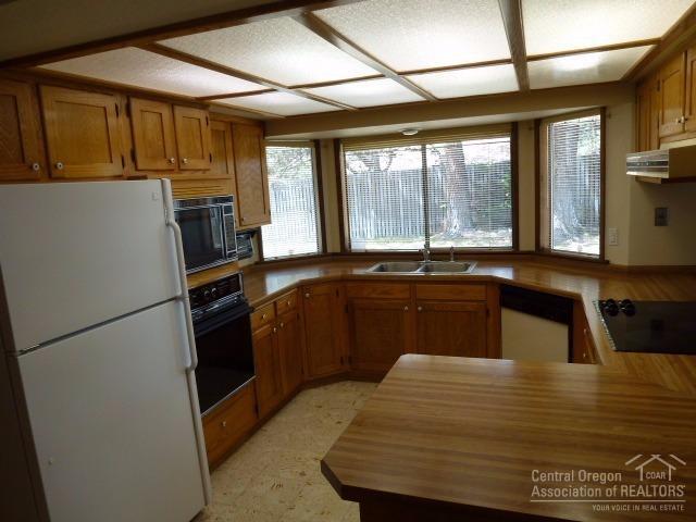 20220 Rae Road Bend, OR 97702 - Photo 2 of 22 Kitchen includes fridge/freezer, microwa