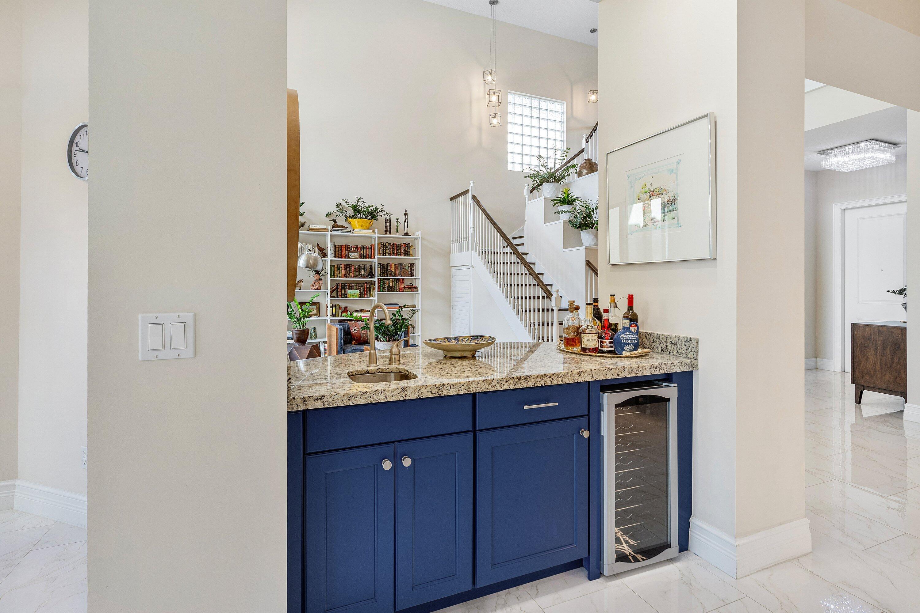 9349 Eden Roc Court Delray Beach, FL 33446 - Photo 12 of 50 a kitchen with sink and window