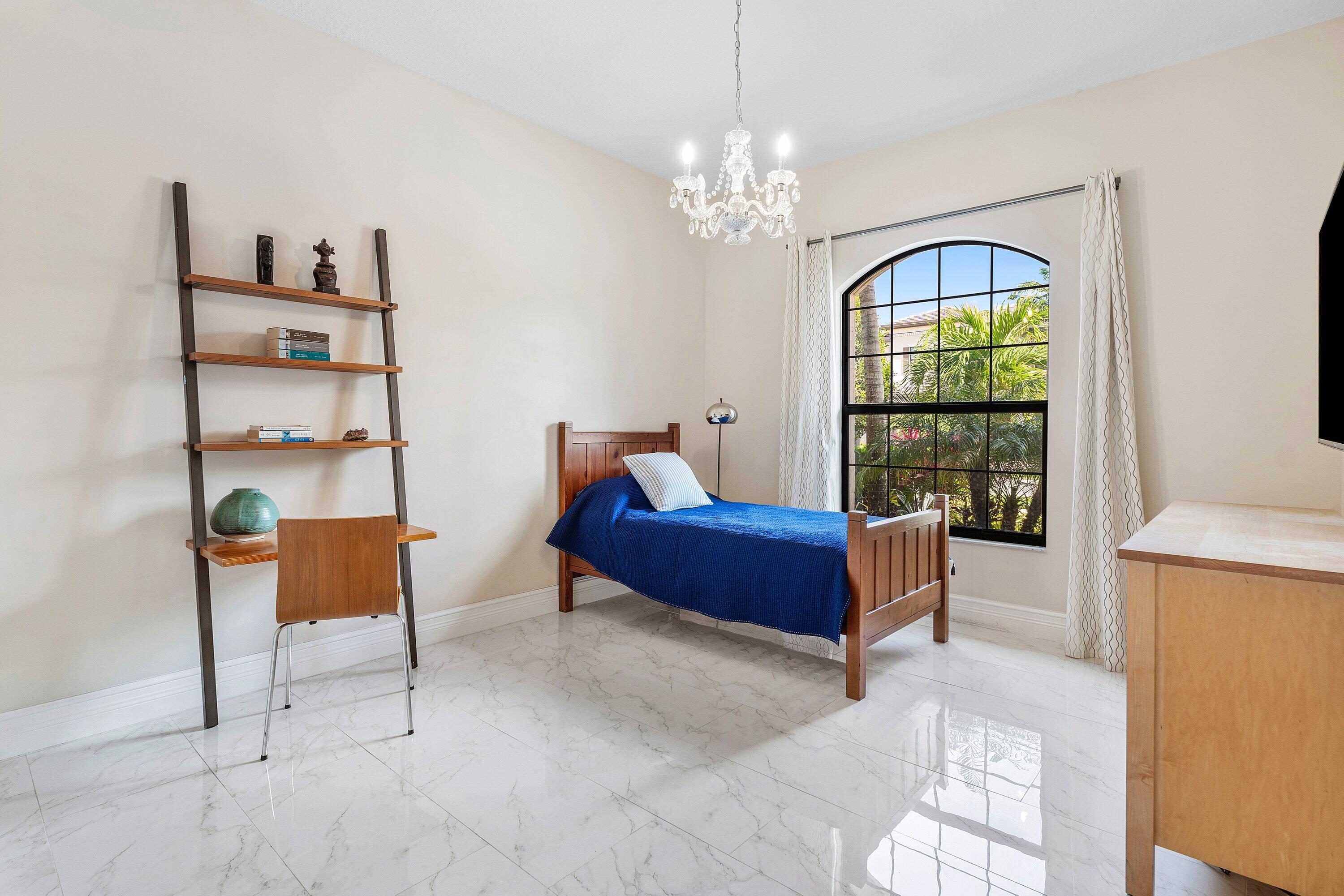 9349 Eden Roc Court Delray Beach, FL 33446 - Photo 22 of 50 a living room with furniture and a window