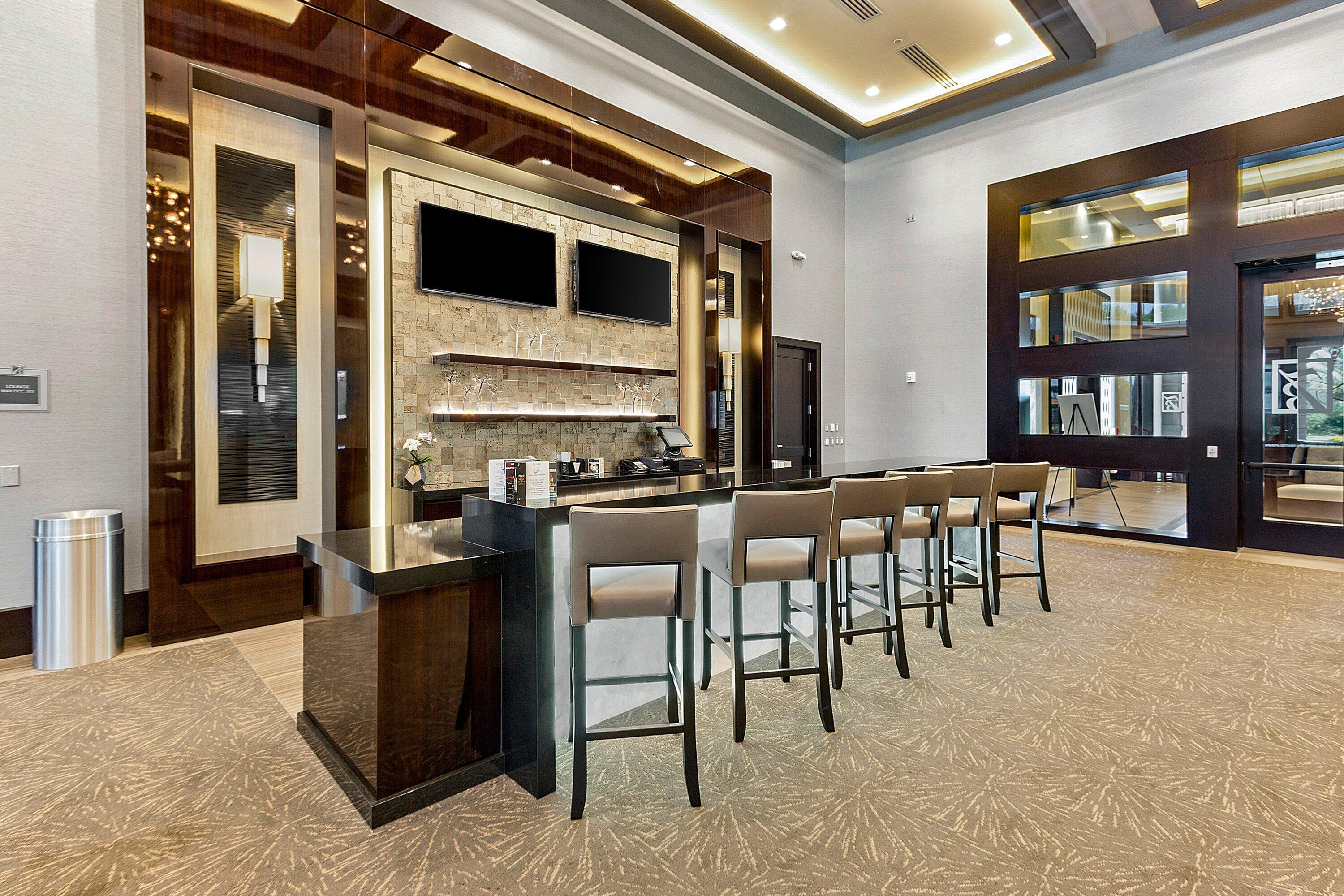 9349 Eden Roc Court Delray Beach, FL 33446 - Photo 35 of 50 a view of a dining room with furniture