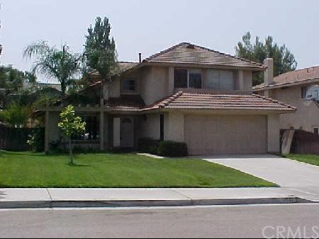 19567 Tangelo Drive Riverside, CA 92508 - Photo 1 of 1 a front view of a house with a yard