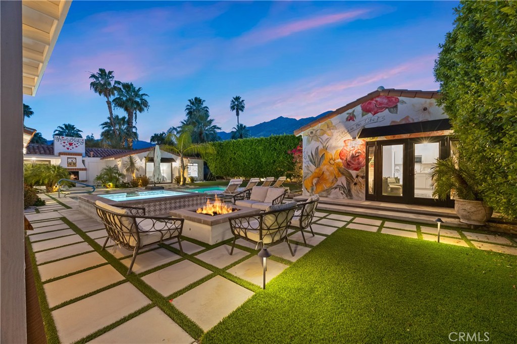 206 East Morongo Road Palm Springs, CA 92264 - Photo 16 of 68 Simulate fire in fire pit & fireplace