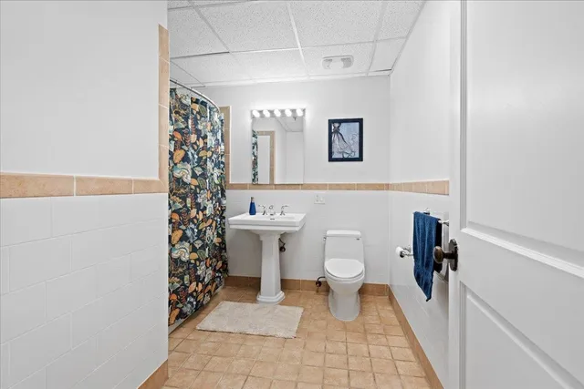 a bathroom with a bathtub and shower