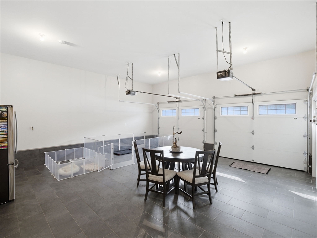 4 Wilshire Lane Pelham, NH 03076 - Photo 31 of 42 a view of a dining room with furniture