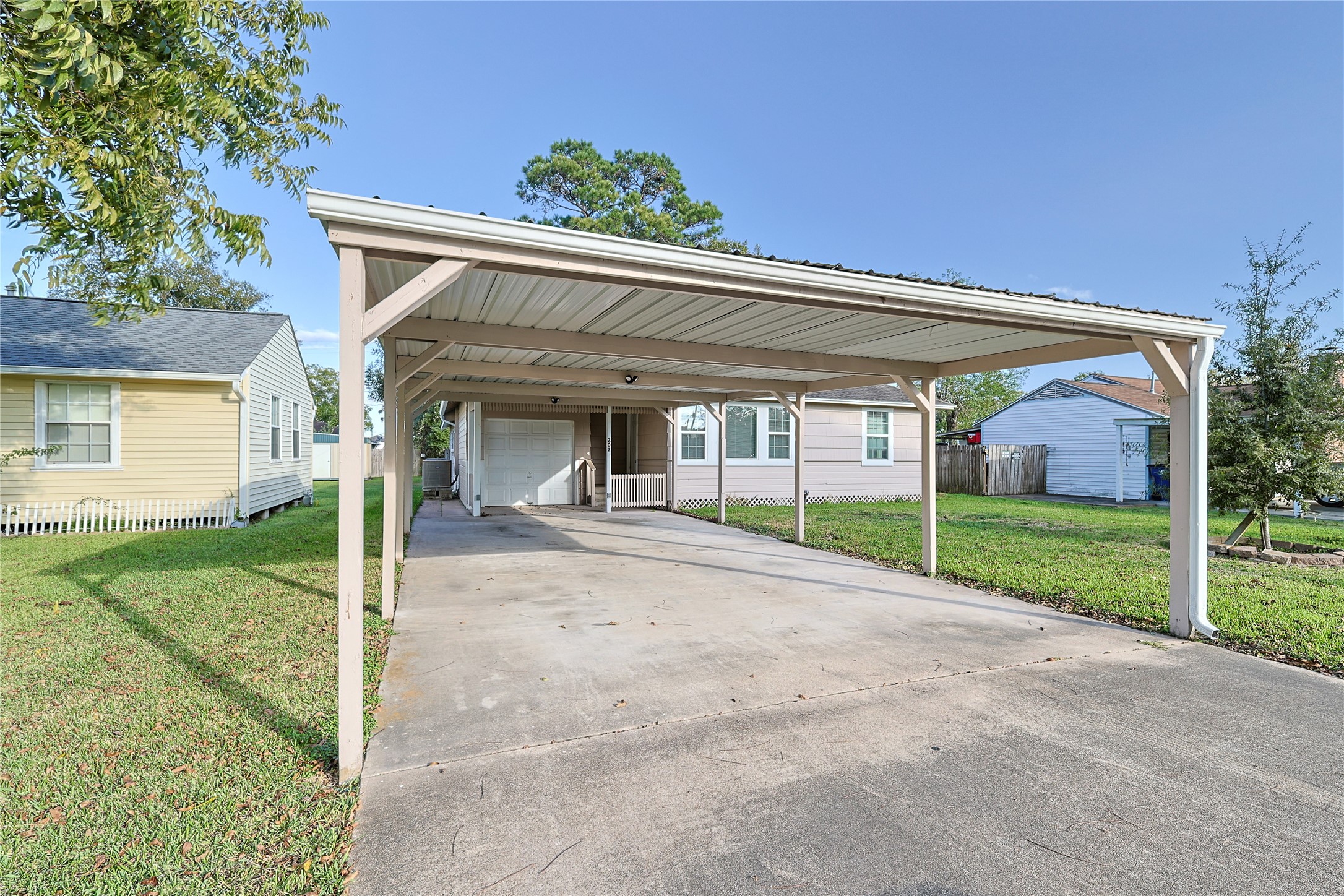 207 Farrer Street Angleton, TX 77515 - Photo 2 of 24 front view of a house with a yard