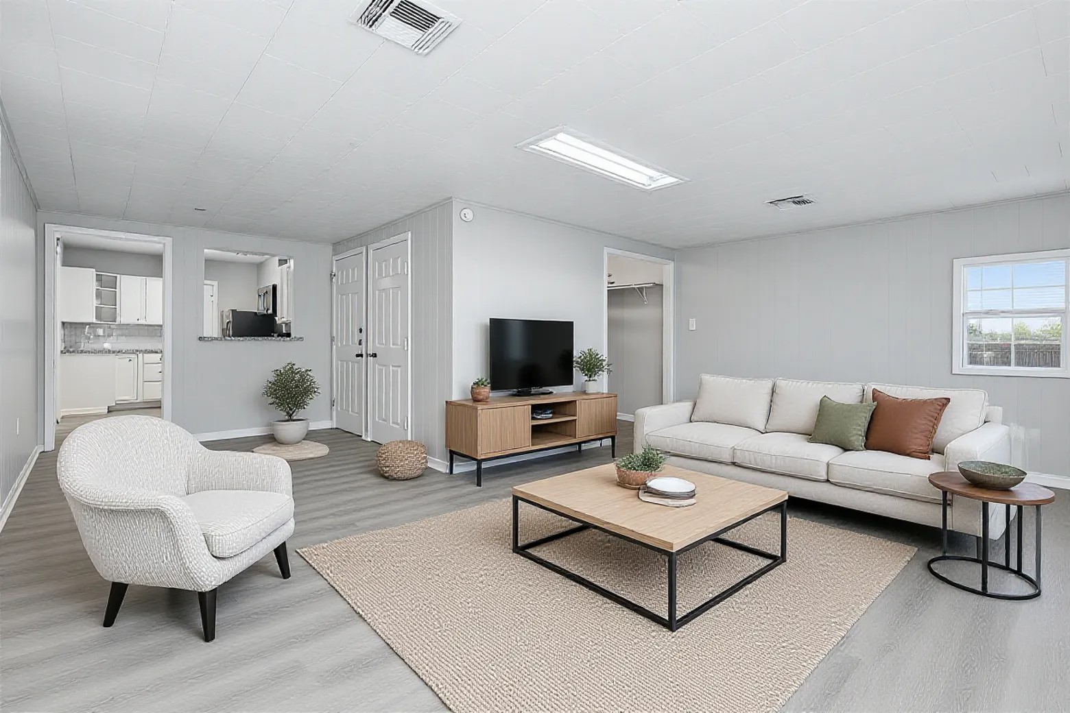 207 Farrer Street Angleton, TX 77515 - Photo 9 of 24 a living room with furniture and a flat screen tv