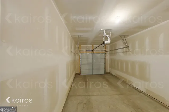 a view of a house with a yard and garage