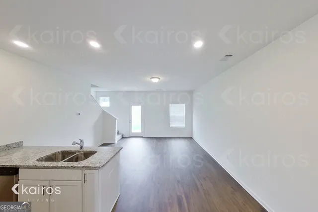 a view of a kitchen and a sink