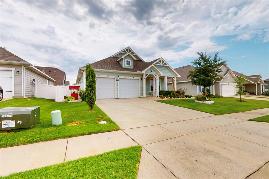 1712 Intervale Road Providence Village, TX 76227 - Photo 2 of 39 a front view of house with yard and green space
