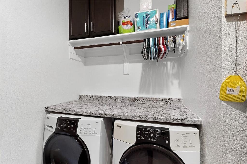 1712 Intervale Road Providence Village, TX 76227 - Photo 34 of 39 a utility room with dryer and washer