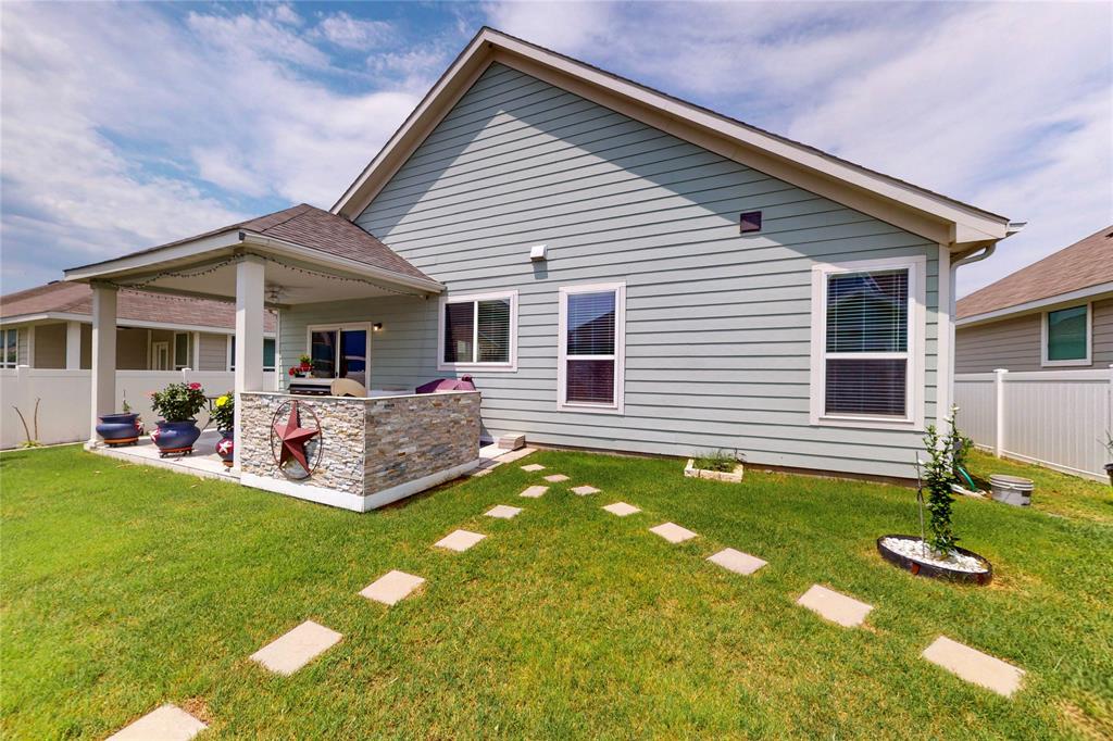 1712 Intervale Road Providence Village, TX 76227 - Photo 36 of 39 a view of a house with swimming pool and porch