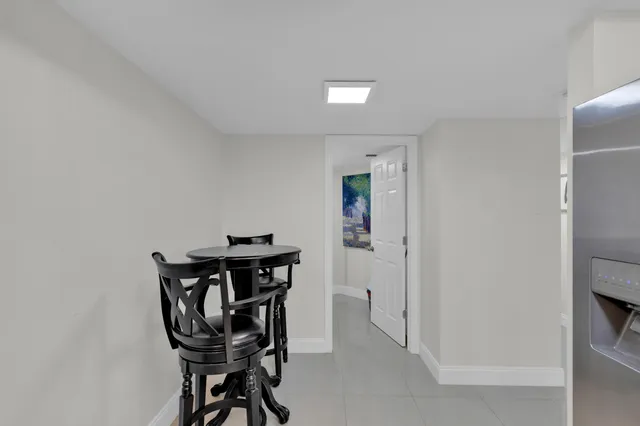 a view of a workspace with furniture