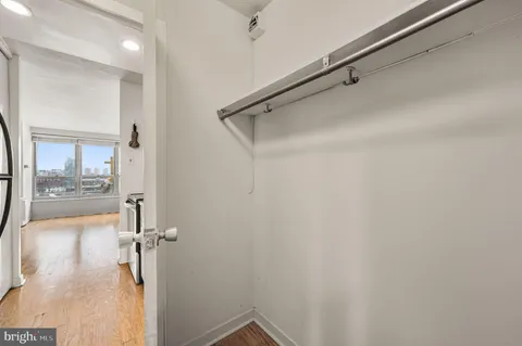 a bathroom with a shower and a sink