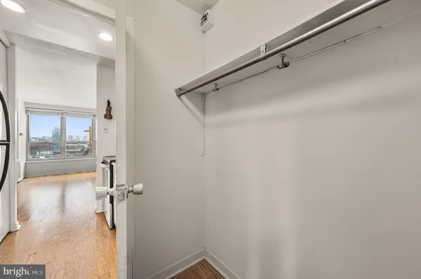 a bathroom with a shower and a sink