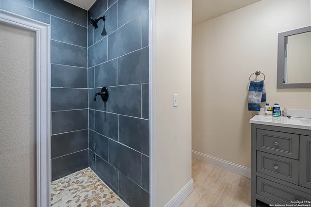 a view of a room with wooden walls