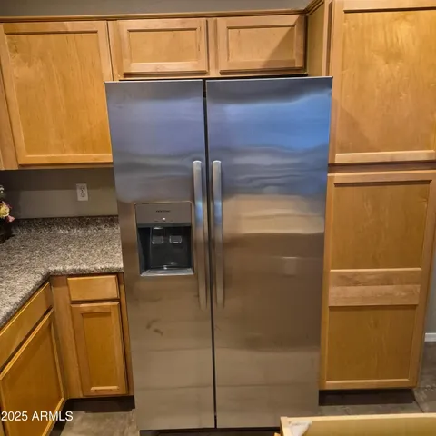 a bathroom with a shower and a sink