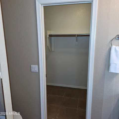 a bathroom with a glass door