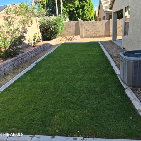 a view of back yard of the house