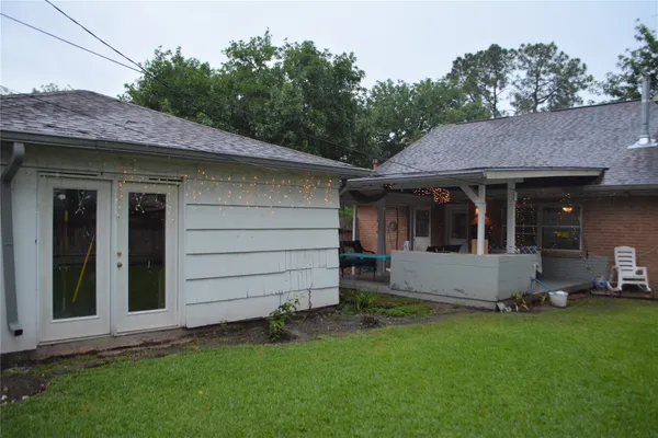 a view of a house with a garden