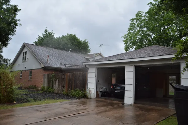 a front view of a house with a garage