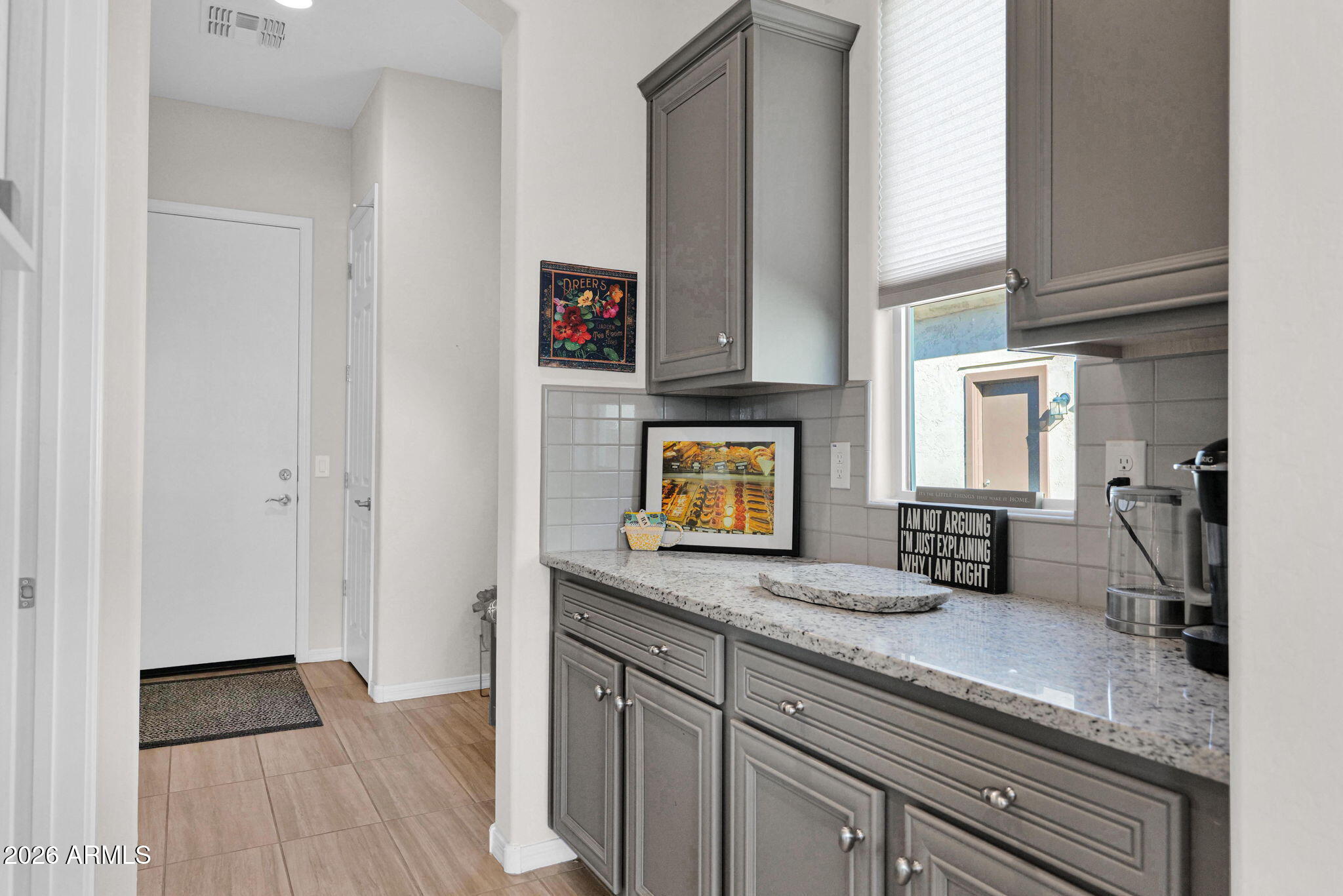 7723 West Willow Way Florence, AZ 85132 - Photo 19 of 64 a bathroom with a sink and a mirror