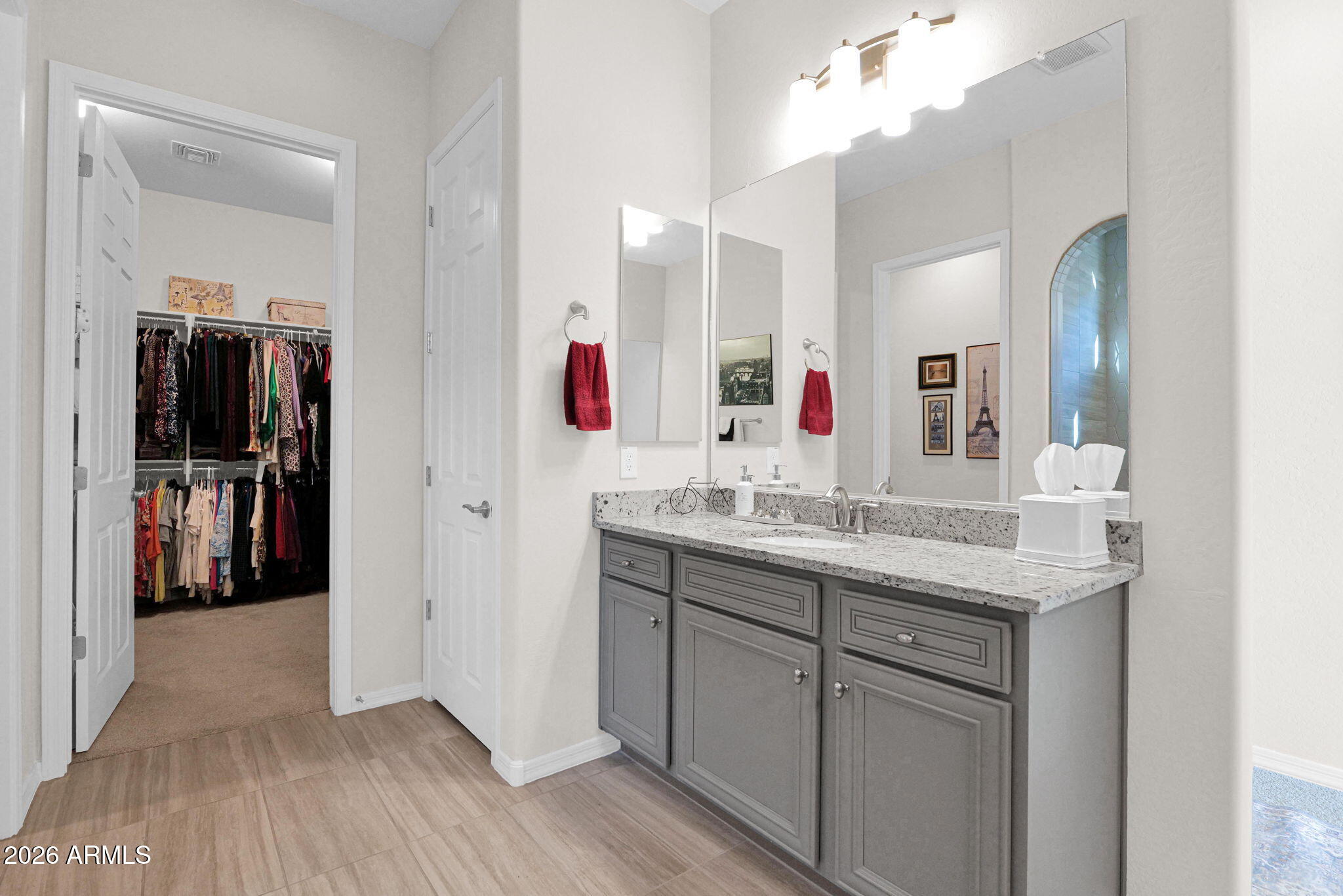 7723 West Willow Way Florence, AZ 85132 - Photo 27 of 64 a bathroom with a sink and a mirror