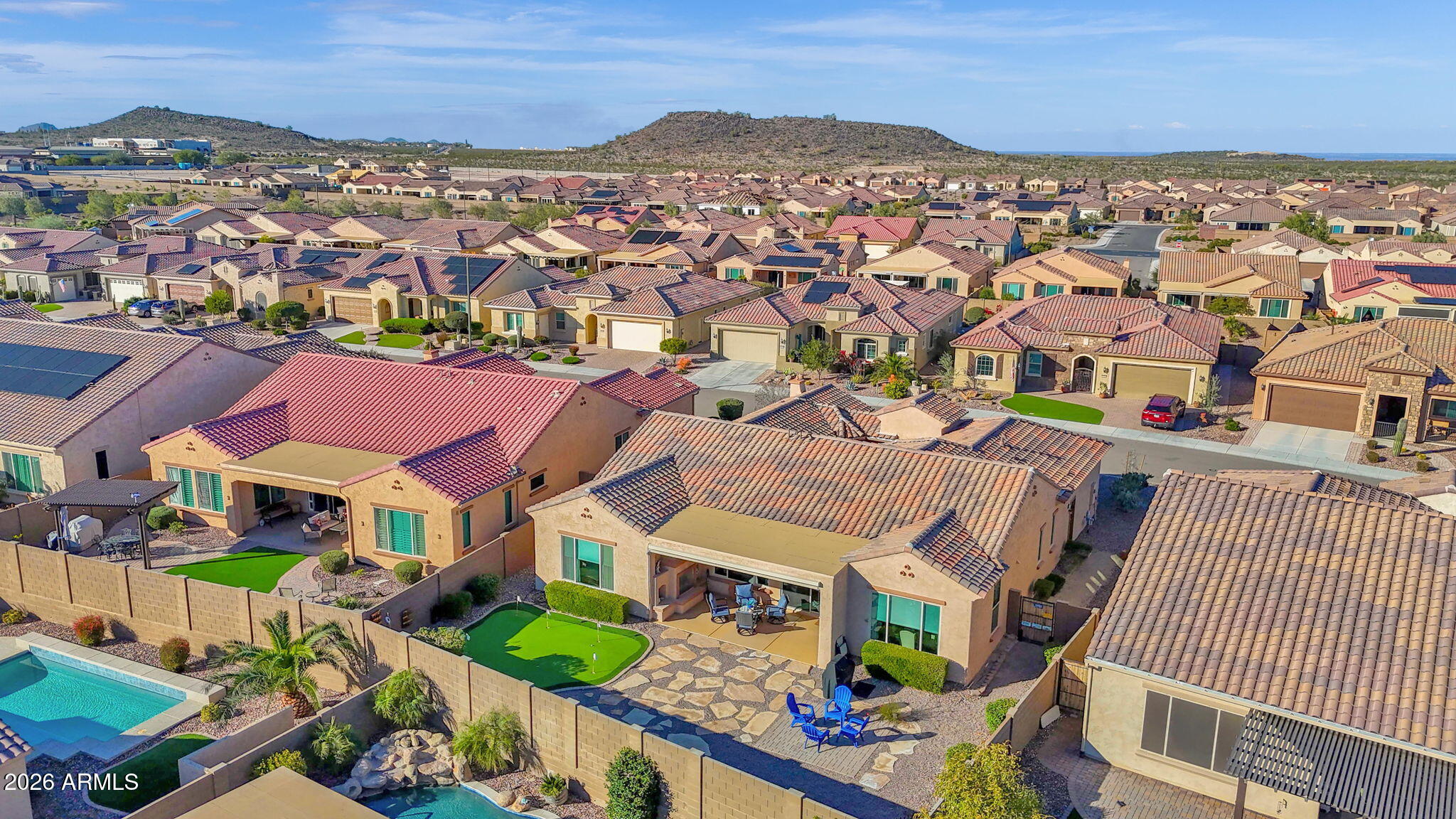 7723 West Willow Way Florence, AZ 85132 - Photo 47 of 64 an aerial view of residential houses with outdoor space and parking