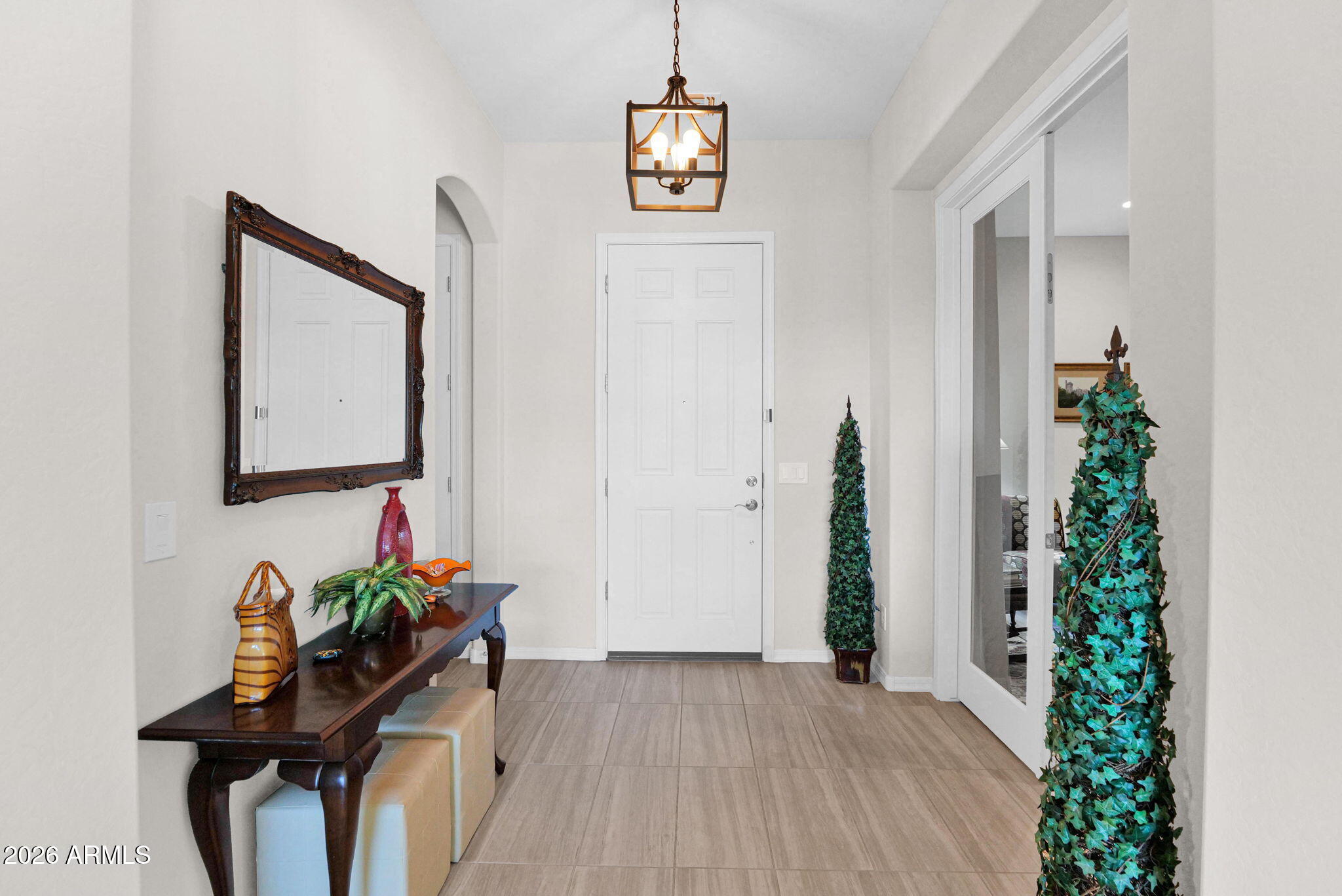 7723 West Willow Way Florence, AZ 85132 - Photo 4 of 64 a view of a hallway with furniture and wooden floor