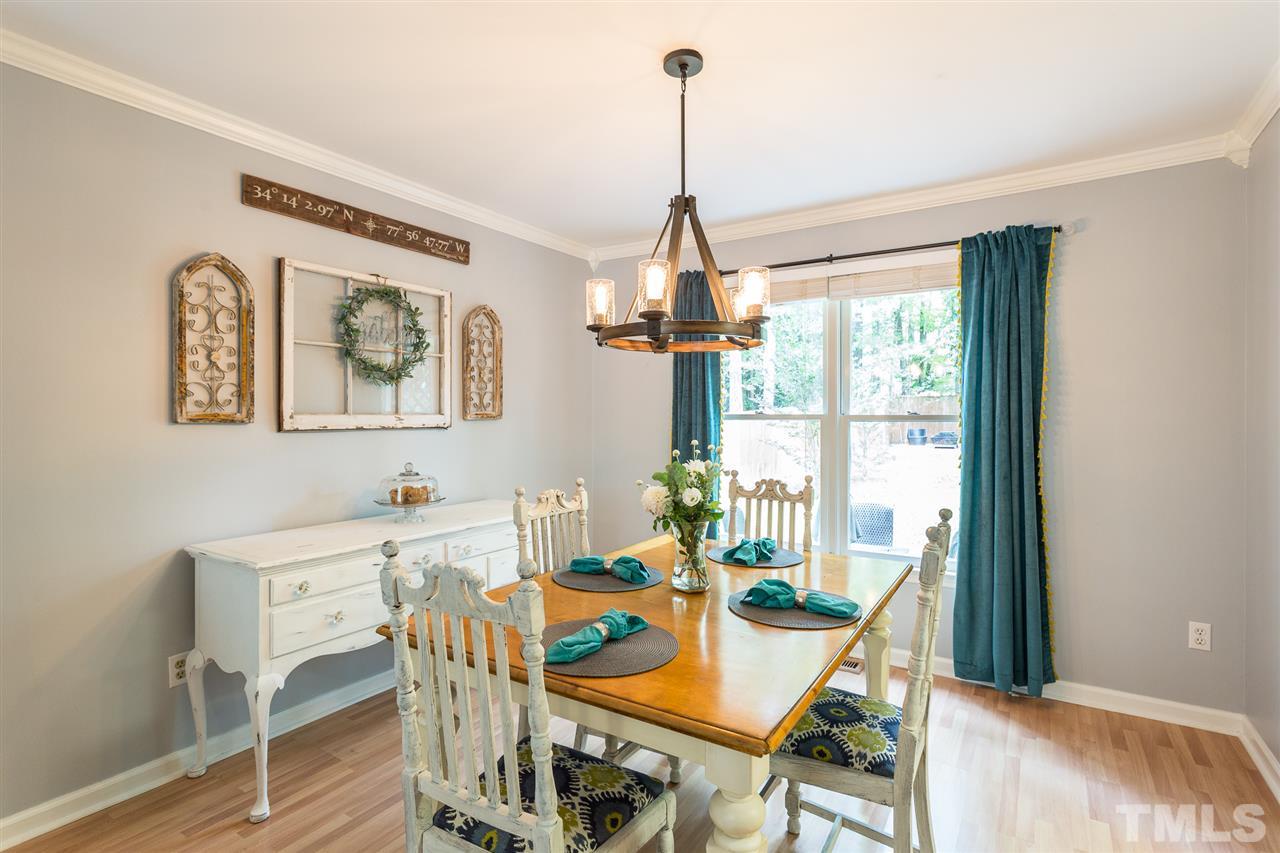 3533 Tunas Street Raleigh, NC 27616 - Photo 17 of 30 a view of a dining room with furniture window and outside view