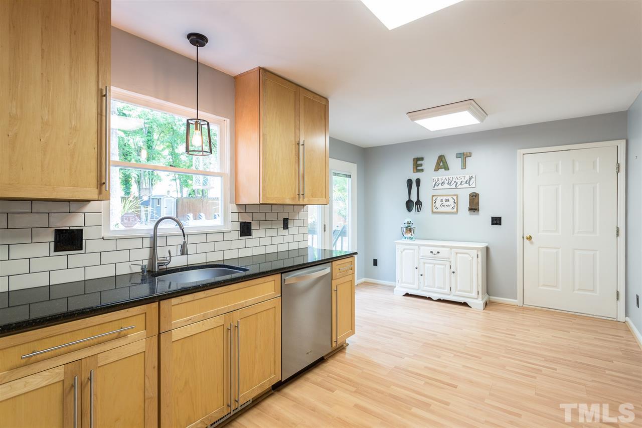 3533 Tunas Street Raleigh, NC 27616 - Photo 19 of 30 a view of a kitchen counter space and windows