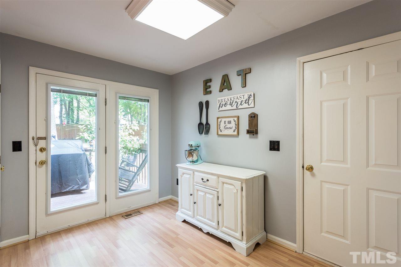 3533 Tunas Street Raleigh, NC 27616 - Photo 23 of 30 a hall with wooden floor and windows