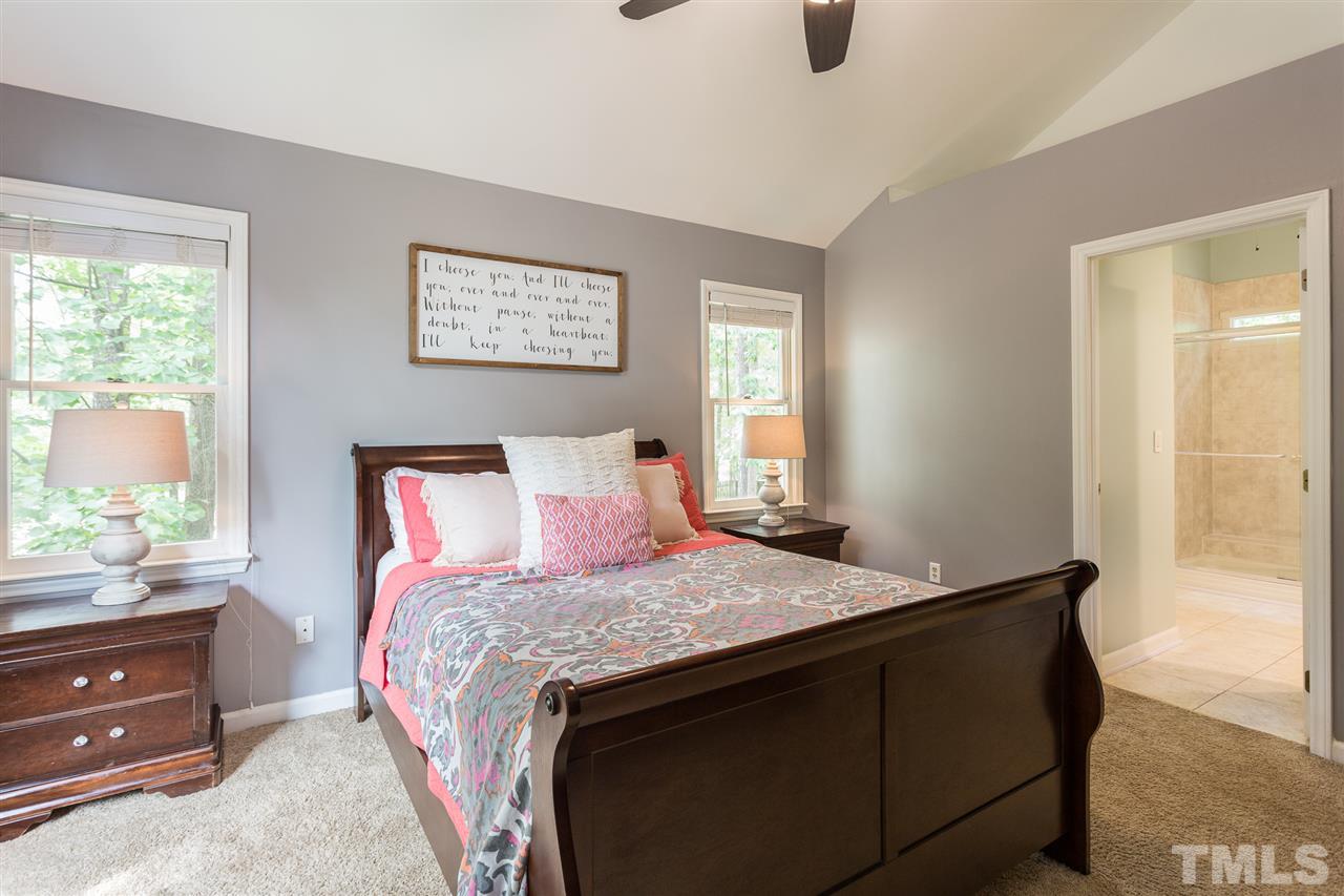 3533 Tunas Street Raleigh, NC 27616 - Photo 27 of 30 a bedroom with a bed and a window