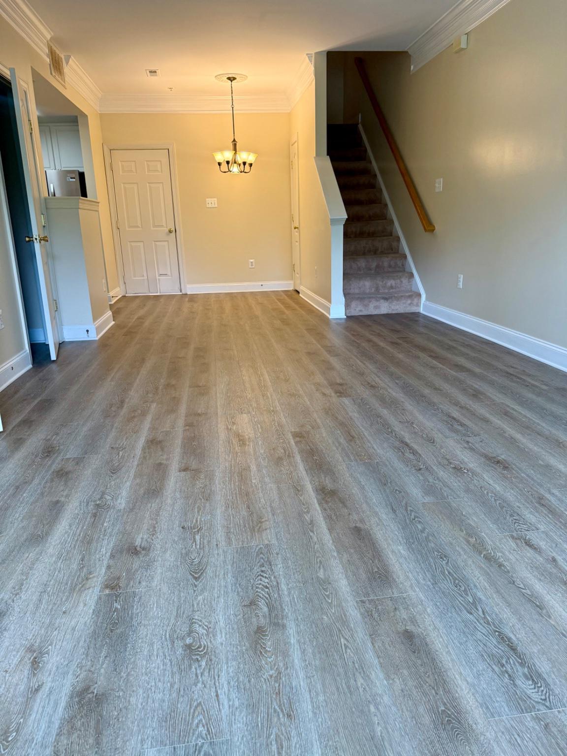 680 Orchard Ridge Drive, Unit 100 Gaithersburg, MD 20878 - Photo 5 of 25 a view of a hallway with wooden floor