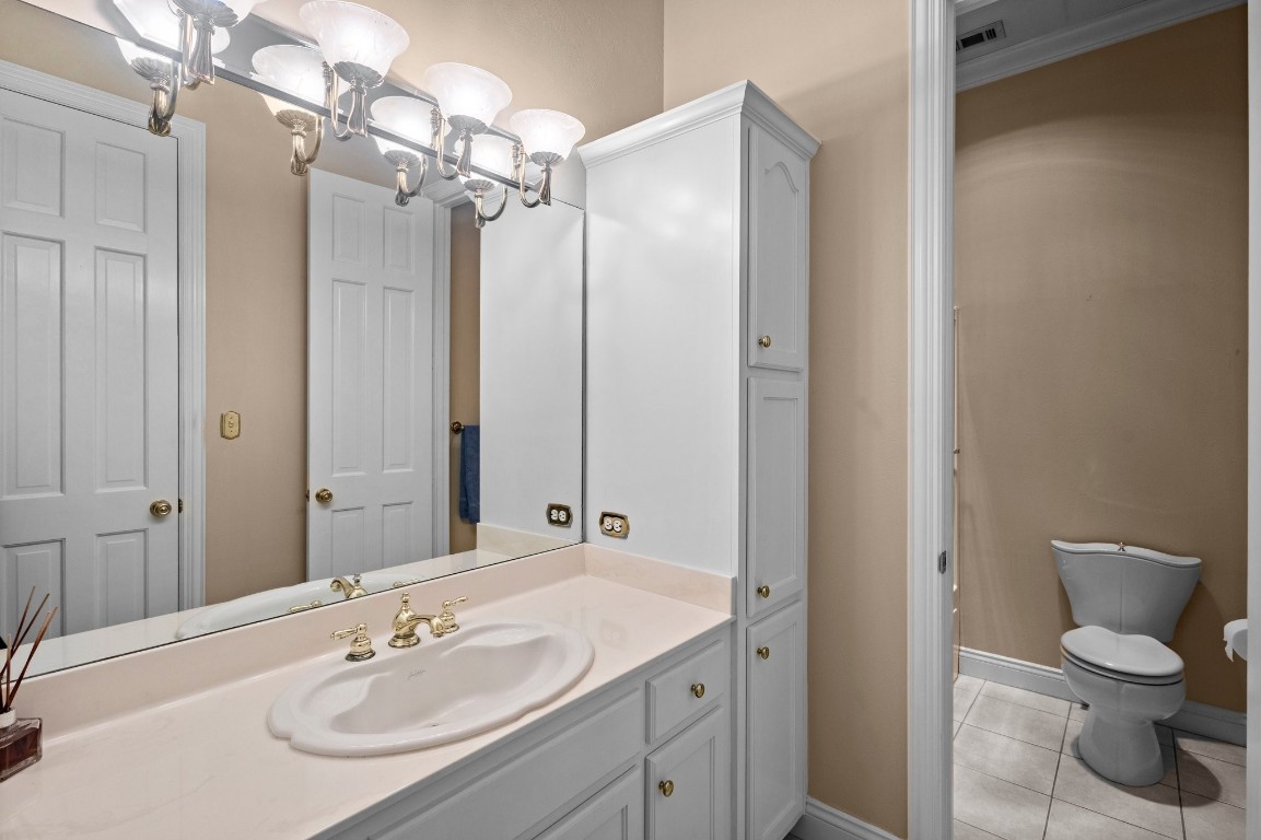 27076 Interstate 10 Winnie, TX 77665 - Photo 16 of 42 a bathroom with a sink toilet and shower