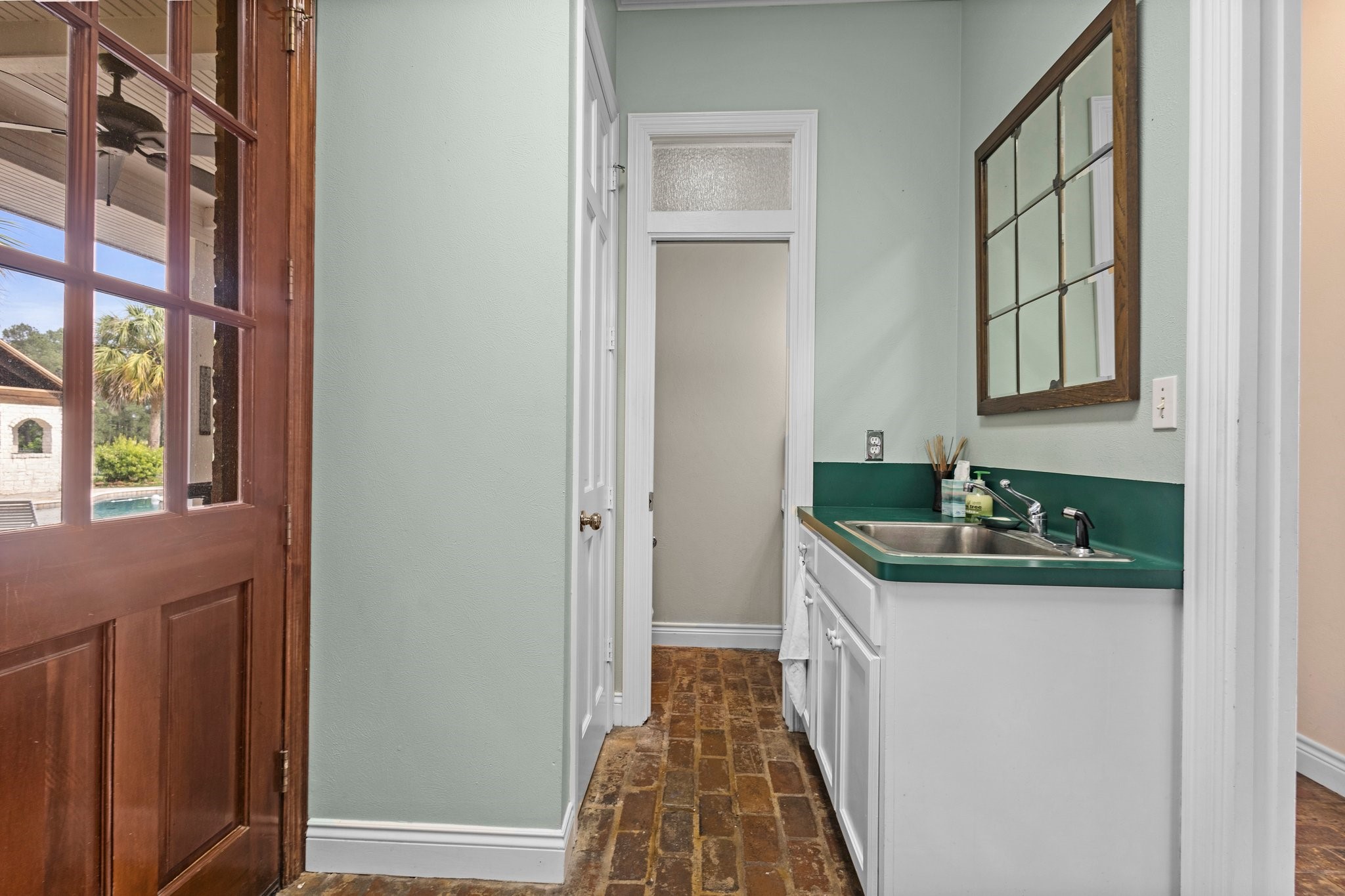 27076 Interstate 10 Winnie, TX 77665 - Photo 22 of 42 a kitchen with a sink and a window