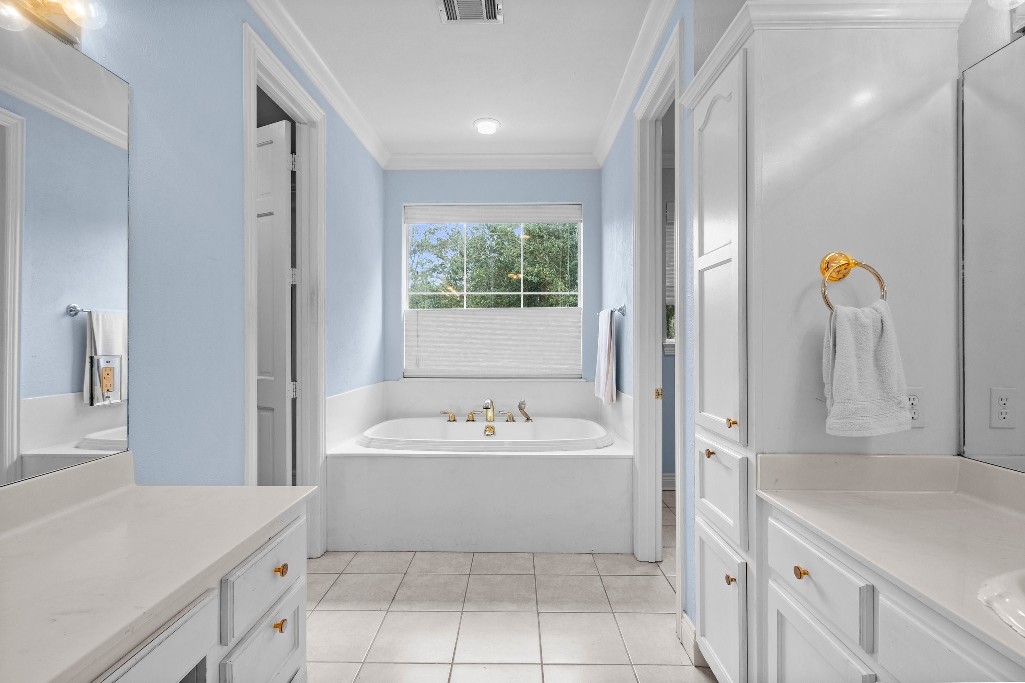 27076 Interstate 10 Winnie, TX 77665 - Photo 25 of 42 a bathroom with a sink vanity tub and shower