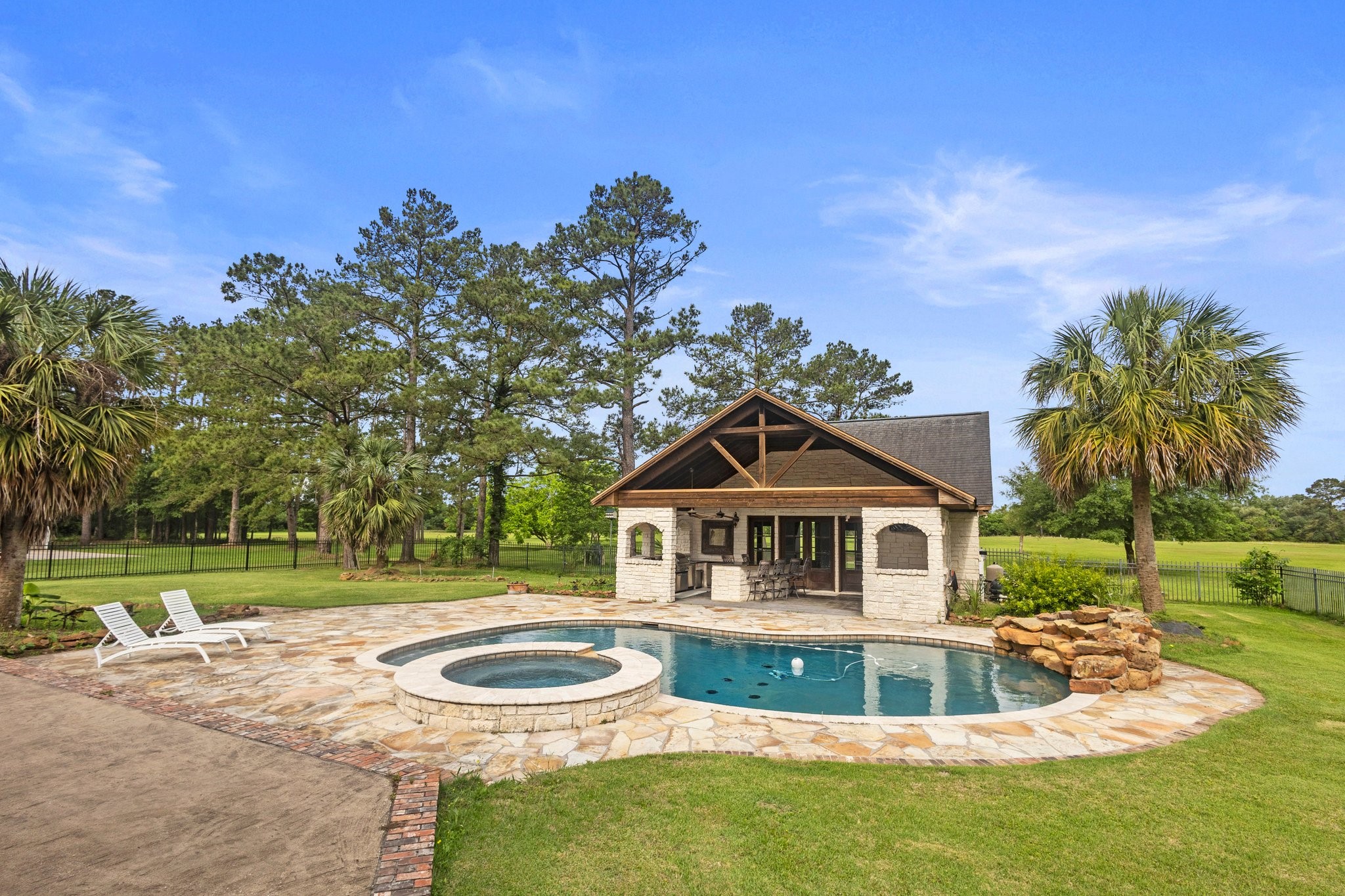 27076 Interstate 10 Winnie, TX 77665 - Photo 36 of 42 a front view of a house with a yard