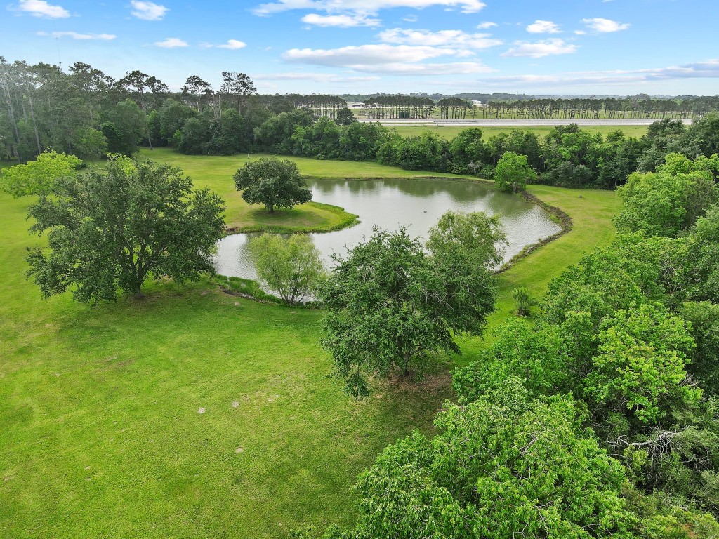 27076 Interstate 10 Winnie, TX 77665 - Photo 41 of 42 a view of a lake with a city