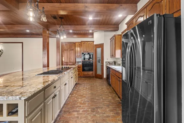 a large kitchen with lot of counter space