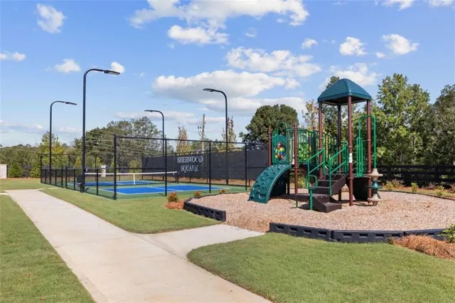 a view of a park with swings