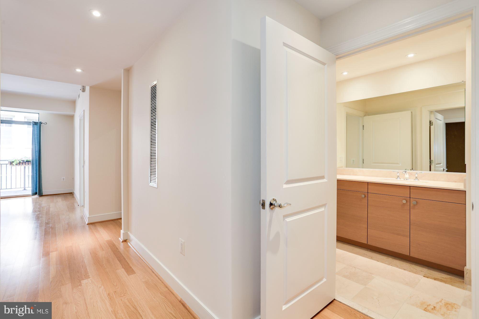 2425 L Street Northwest, Unit 533 Washington, DC 20037 - Photo 17 of 28 Newly restored, gleaming marble! Dual entry bath.