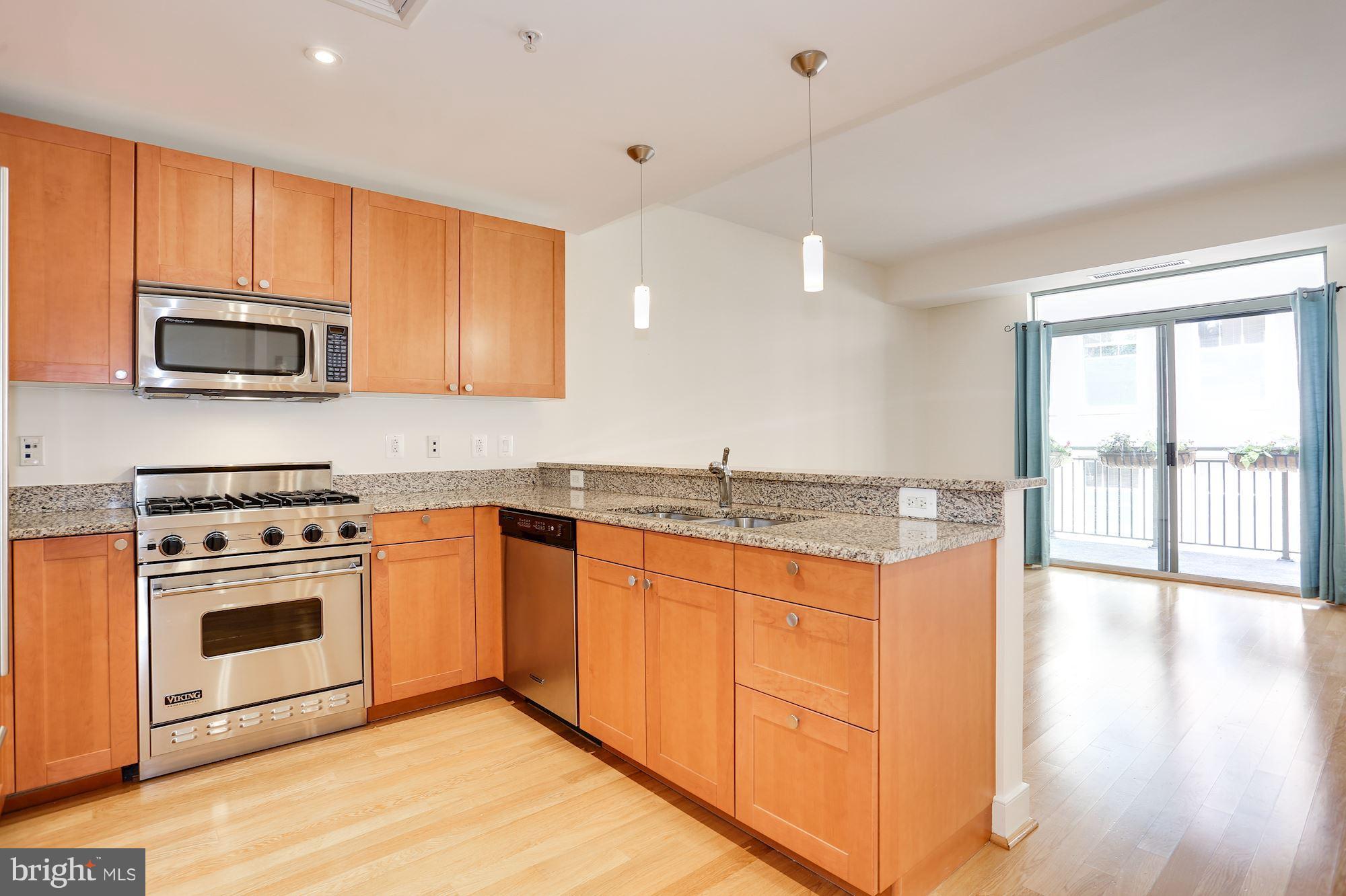 2425 L Street Northwest, Unit 533 Washington, DC 20037 - Photo 7 of 28 Pogenpohl soft close cabinetry
