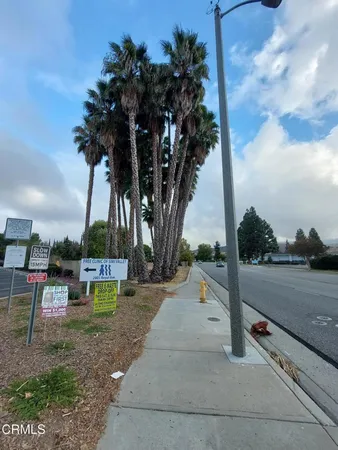 a view of a park with swings