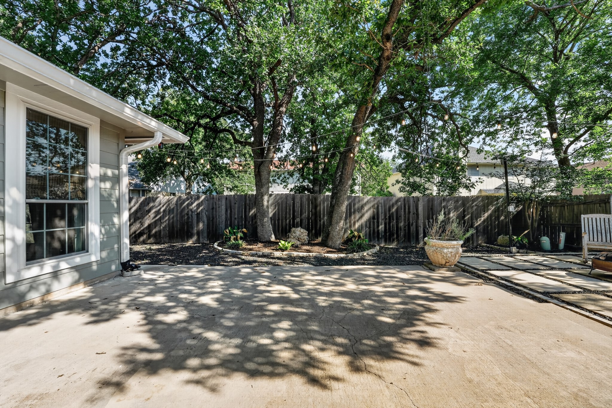 1811 Old Mill Road Cedar Park, TX 78613 - Photo 31 of 39 A spacious backyard patio provides ample room for outdoor enjoyment and entertaining.