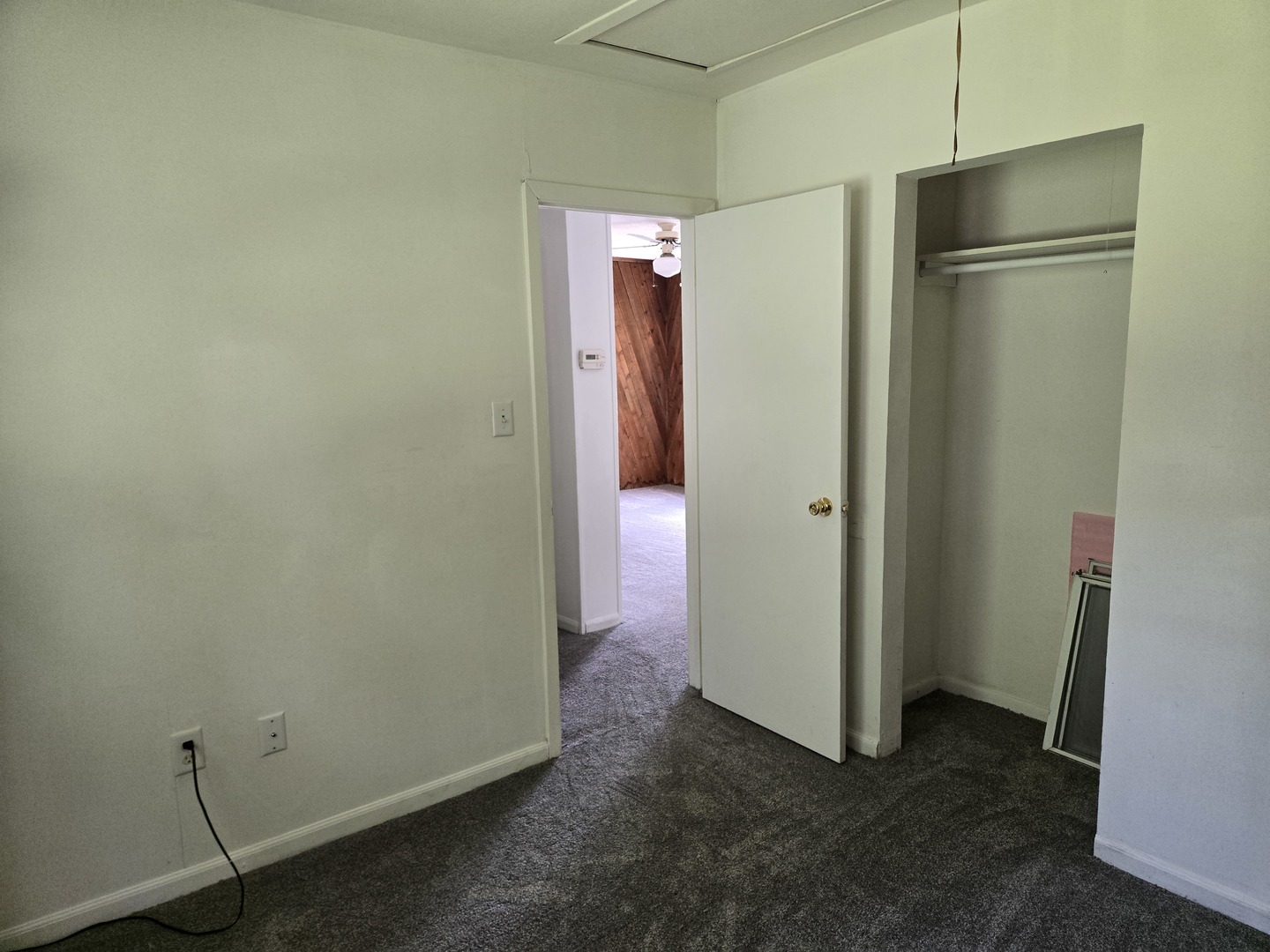 26895 Bernice Street Wauconda, IL 60084 - Photo 12 of 16 a view of an empty room with closet and a mirror