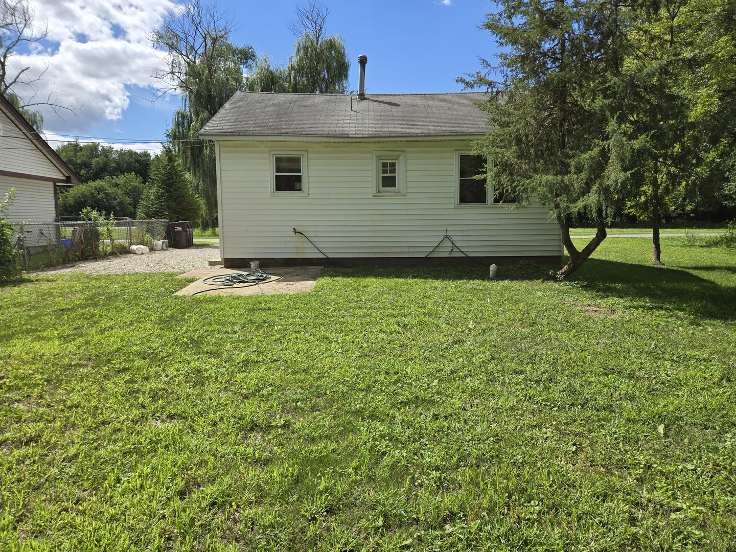 26895 Bernice Street Wauconda, IL 60084 - Photo 15 of 16 a backyard of a house with lots of green space