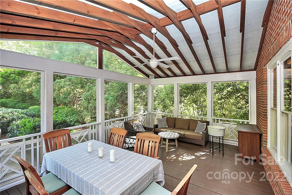 7319 St Clair Drive Charlotte, NC 28270 - Photo 29 of 39 a view of a patio with a table chairs and a patio