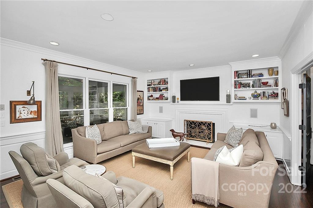 7319 St Clair Drive Charlotte, NC 28270 - Photo 9 of 39 a living room with furniture window and a flat screen tv