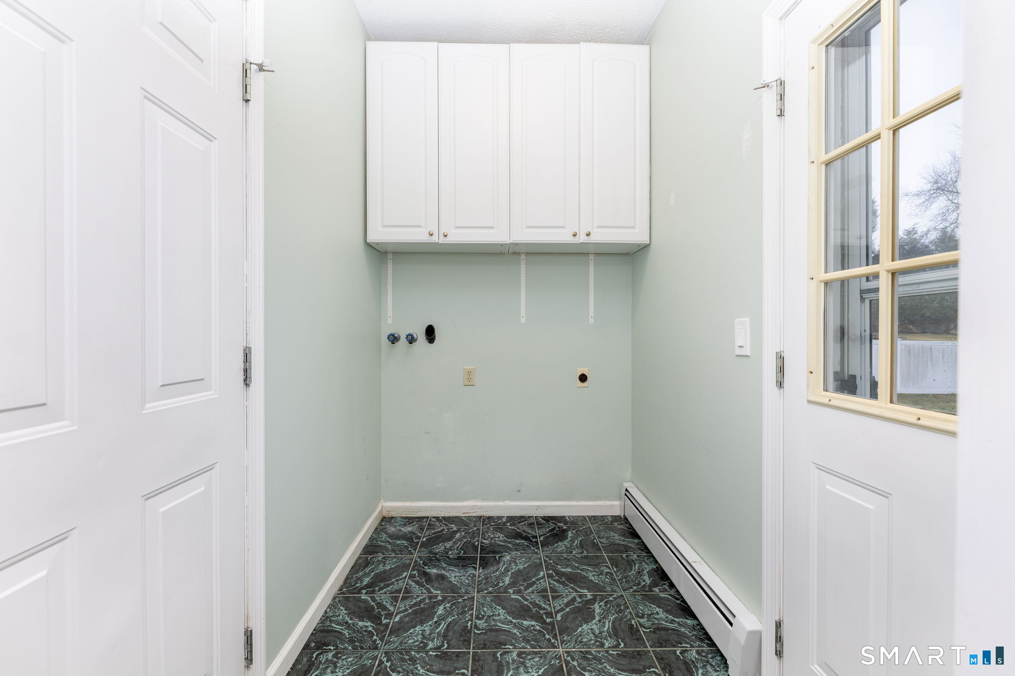 559 West Main Street Hebron, CT 06231 - Photo 29 of 29 a view of hallway with washer and dryer
